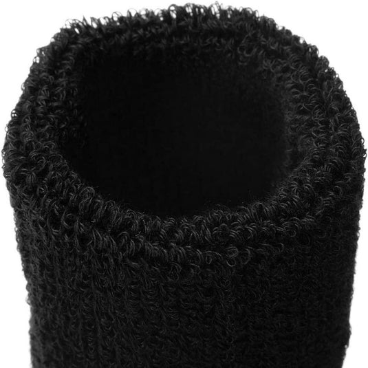 Close-up van de bovenkant van een zwart, fuzzy-textured cilindrisch object met een opening in het midden, voorzien van Ultimate Comfort katoenen zweetbanden voor uitst