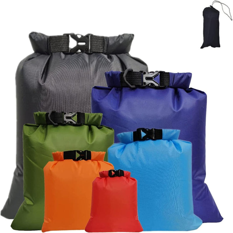 Laad afbeelding in Galerijviewer, Set van diverse gekleurde duurzame waterdichte dry bags voor buitenactiviteiten.
Productnaam: Ga zorgeloos op avontuur met onze AquaNova waterdichte zakken!
