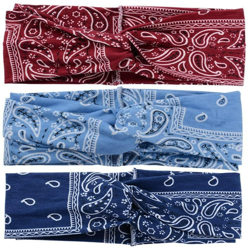 Laad afbeelding in Galerijviewer, Drie Bloemenhoofdbanden op elkaar gestapeld, met de kleuren rood, blauw en marineblauw, elk netjes gevouwen om patronen weer te geven. Ze zijn gemaakt van een katoenmix.
