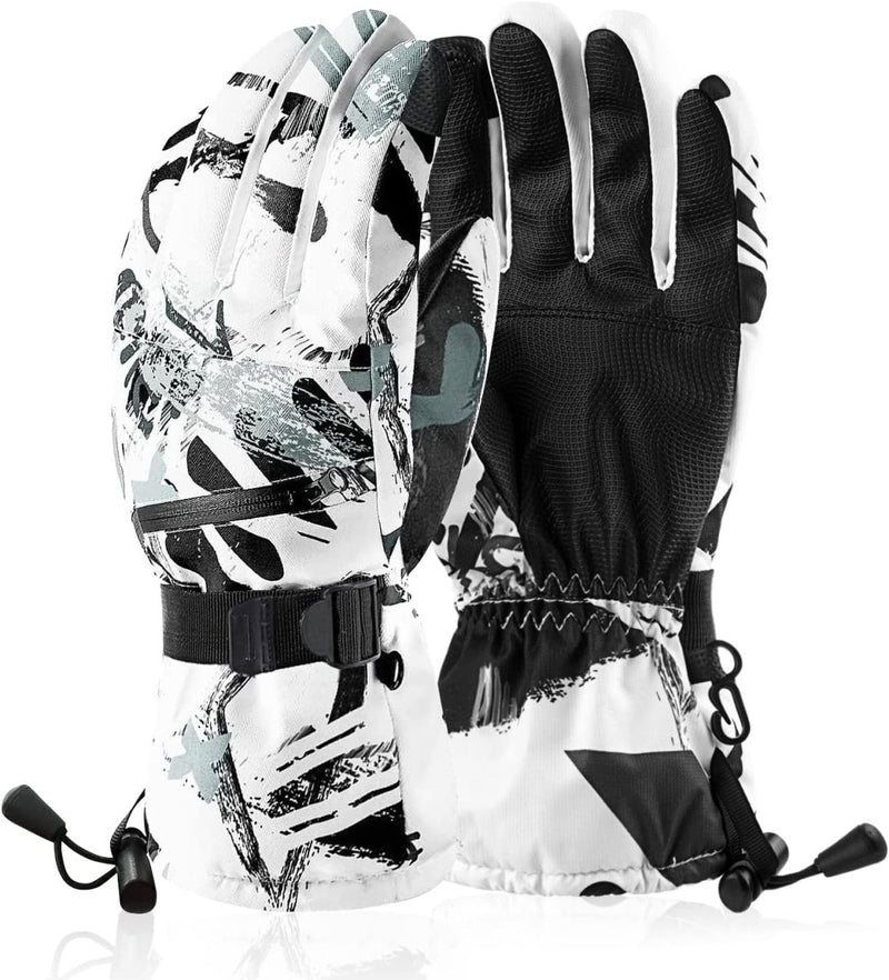 Laad afbeelding in Galerijviewer, Een paar witte en zwarte geblokte skihandschoenen met verstelbare bandjes en vastgemaakte clips.
