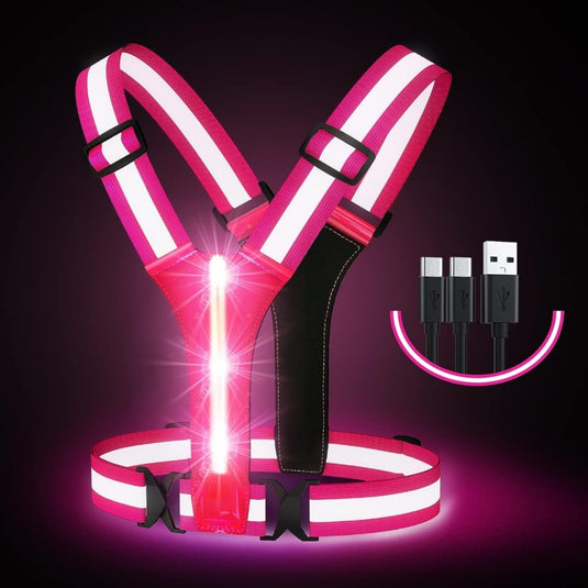 LED-reflecterend hardloopvest: zorg voor zichtbaarheid en veiligheid tijdens het hardlopen met reflecterende roze en witte strepen, weergegeven tegen een donkere achtergrond met bijgeleverde USB-kabels.