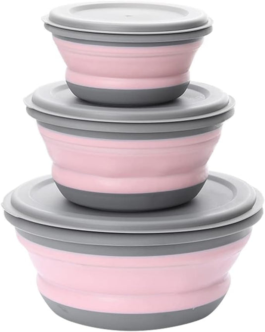 Een stapel van vier Opvouwbare siliconen kommen in verschillende maten, van klein tot groot, met roze en grijze kleuren, gemaakt van voedselveilige siliconen.