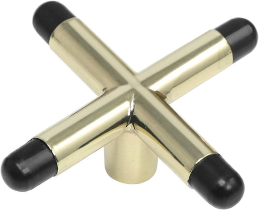 Twee messingkleurige keubruggen gekruist in een x-vorm, elk getipt met zwarte rubberen uiteinden, tegen een witte achtergrond.