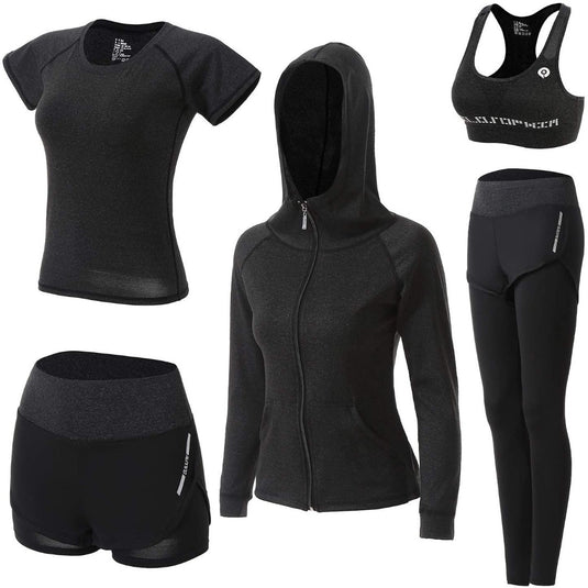 Een collectie Trainingspak dames: comfortabel, stijlvol en veelzijdig, waaronder een t-shirt, hoodie, sportbeha, shorts en leggings, allemaal in het zwart.