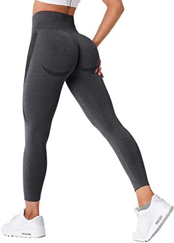 Laad afbeelding in Galerijviewer, Een persoon die de &quot;Ervaar ultiem comfort en stijl met onze compressie sportlegging!&quot; in donkergrijs met hoge taille en witte sneakers, zijwaarts staand.
