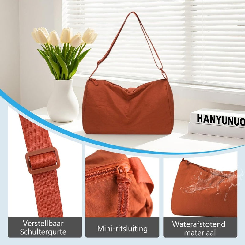 Laden Sie das Bild in Galerie -Viewer, Kleine sporttas dames 33 x 21 cm van waterafstotend nylon met verstelbare schouderriem – gymtas – fitnessschoudertas - happygetfit.com

