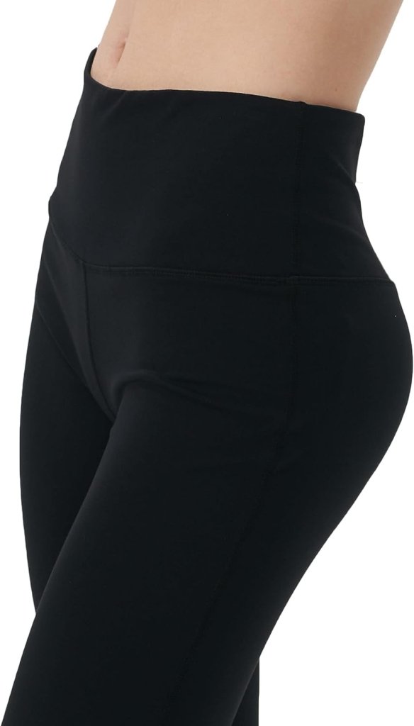 Laad afbeelding in Galerijviewer, Een persoon toont de Yoga broek voor vrouwen, met de nadruk op het slanke ontwerp van de buikcontrole, in het zwart met een hoge taille, tegen een effen achtergrond.
