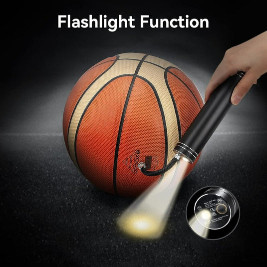 Een hand die een basketbal vasthoudt met Opblaasgemak met Intelligentie: Ontdek de Intelligente ballenpomp met drukherkenning.