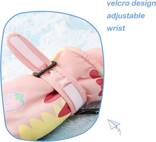 Een afbeelding van een roze sneeuwpak met verstelbare polsen, geschikt voor kinderen. Houd de handen van je soort warm en droog met deze kinderskihandschoenen.