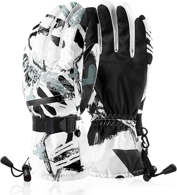 Een paar witte en zwarte geblokte skihandschoenen met verstelbare bandjes en vastgemaakte clips.