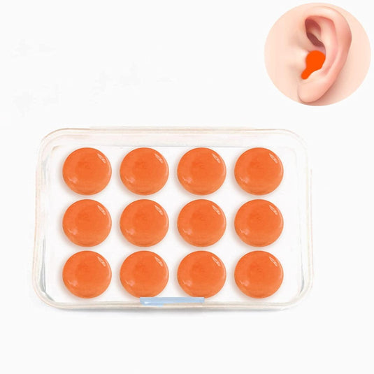 Een set oranje oordopjes met uitstekende geluidsreductieprestaties, opgeborgen in een plastic doosje.
