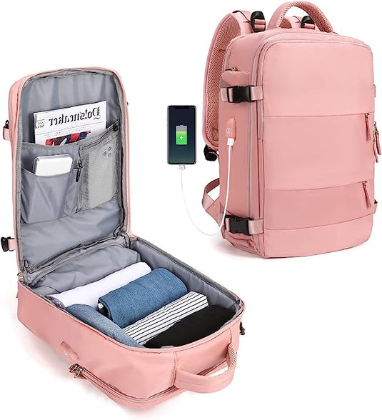 De ultieme reisrugzak voor elk avontuur in een roze rugzak met meerdere open compartimenten, met interne organisatie voor kleding en elektronica; één compartiment is voorzien van een oplaadkabel en een USB-oplaadpoort.