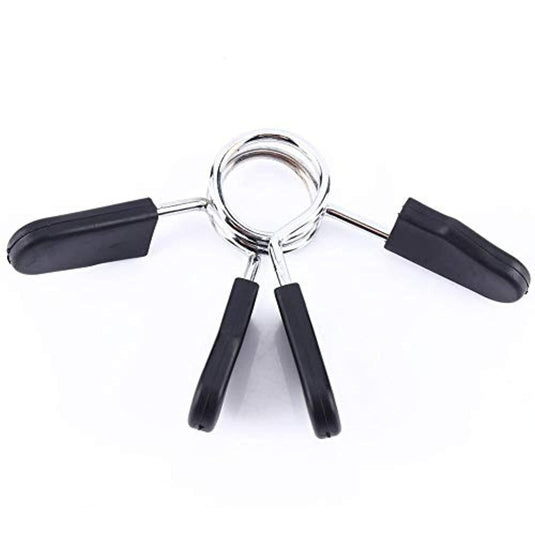 Een set van vier zwarte plastic sleutels op een witte achtergrond, geschikt voor Veilig en efficiënt trainen met springclipkragen voor gewichtheffen tijdens gewichtheffen.