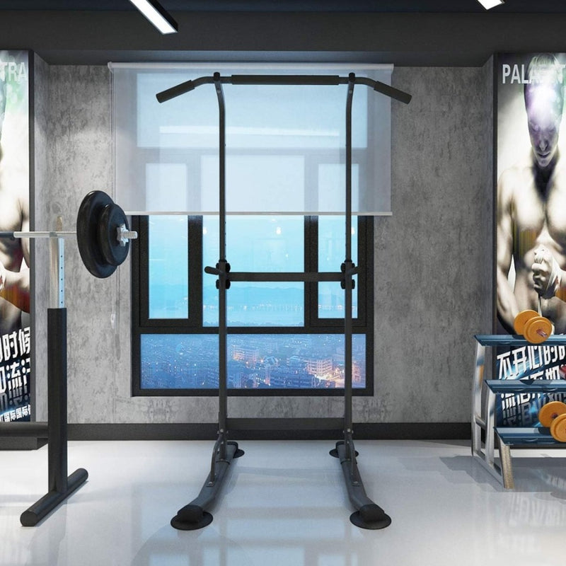Laad afbeelding in Galerijviewer, Een fitnessruimte uitgerust met een verstelbare powertower en gewichten, biedt de perfecte ruimte voor een training om spiermassa op te bouwen.
