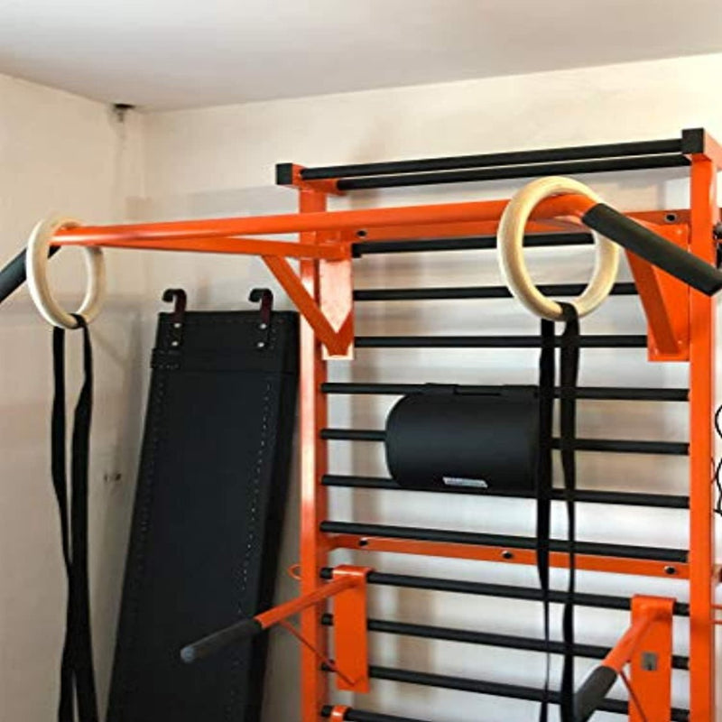 Load image into Gallery viewer, Een zwart en oranje fitnessapparatuurrek voor Ontketen je feitelijke kracht met onze veelzijdige metalen workoutset voor gymnastiek! in een kamer.
